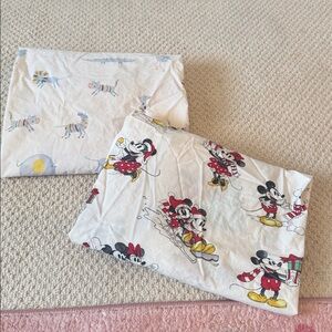 2 pottery barn, crib, sheets, animal print/Mickey Christmas print